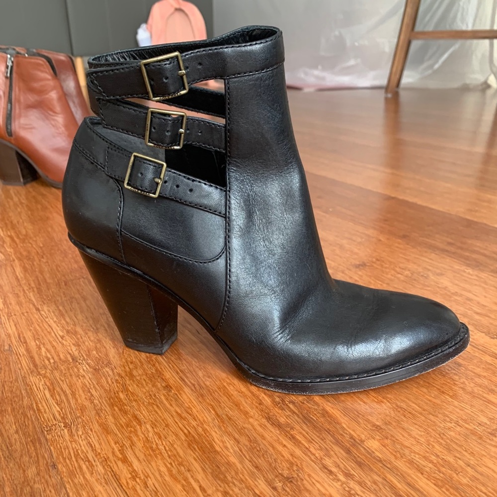 Black Cole Haan Booties with buckle accents
